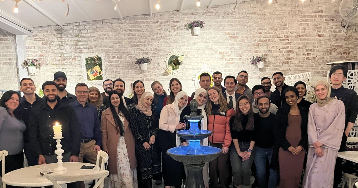 A group of people smiling.