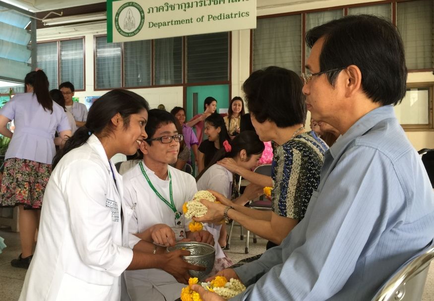 GW students working with host country family