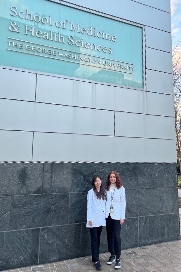 Residents standing outside the SMHS at GW